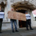 Protestors hold placards outside of the Supreme Court in London, Britain, November 15, 2023. REUTERS/Peter Nicholls
